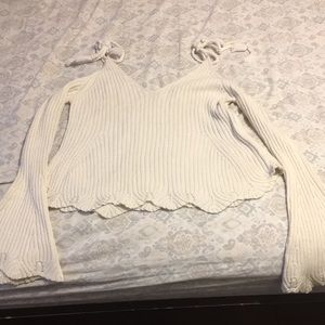 Cream open shoulder sweater.